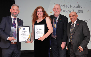 Four people smile at an award ceremony, with two holding certificates. The background displays "Mersey Faculty GP Award 2025." They appear celebratory and formal.