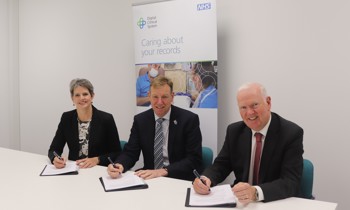 CONTRACT SIGNED: From left to right, Charlotte Jackson, CEO of MEDITECH International; Russ Favager, Interim Chief Executive at Mid Cheshire Hospitals NHS Foundation Trust; Ged Murphy, Chief Executive of East Cheshire NHS Trust