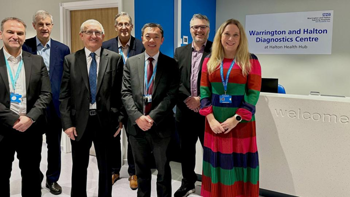 Chief Executive Simon Constable with staff and dignitaries, including MPs Mike Amesbury and Derek Twigg, at the opening of Warrington and Halton Diagnostics Centre at Halton Health Hub