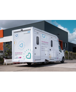 The Living Well Bus, large white van